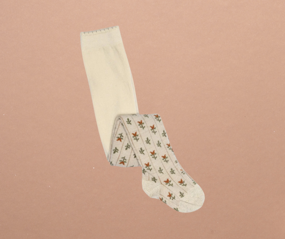 Kennedy Spice Tight from Shop Little Millers — soft oatmeal-base children’s tights with delicate spice-colored floral tulip pattern, stretch knit for a comfortable fit, designed in Arizona with OEKO-TEX® certified fabric safe for sensitive skin.